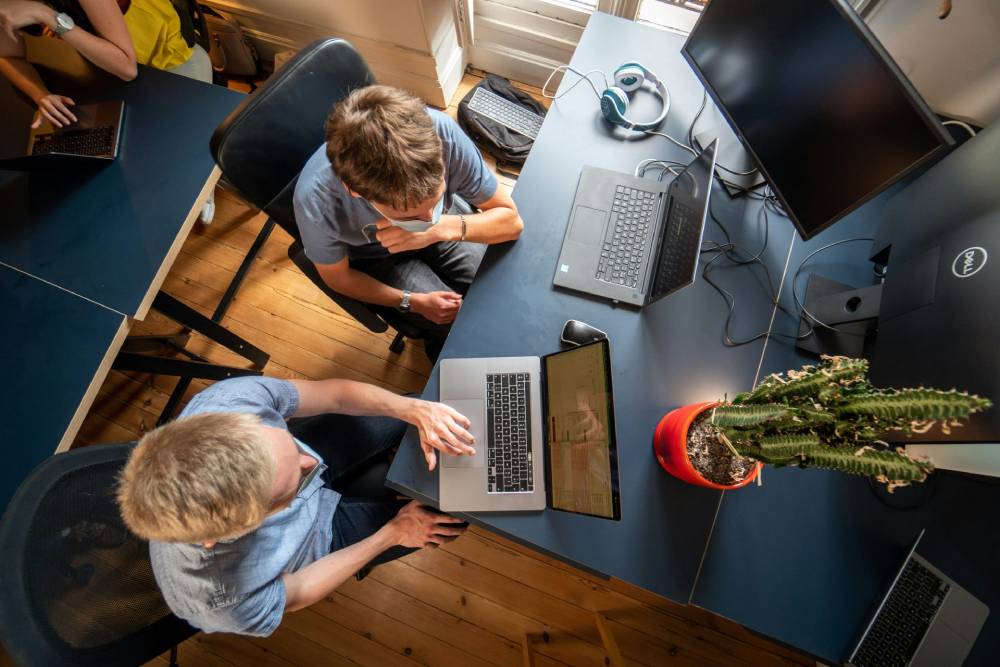 Collaborative workspace with laptops